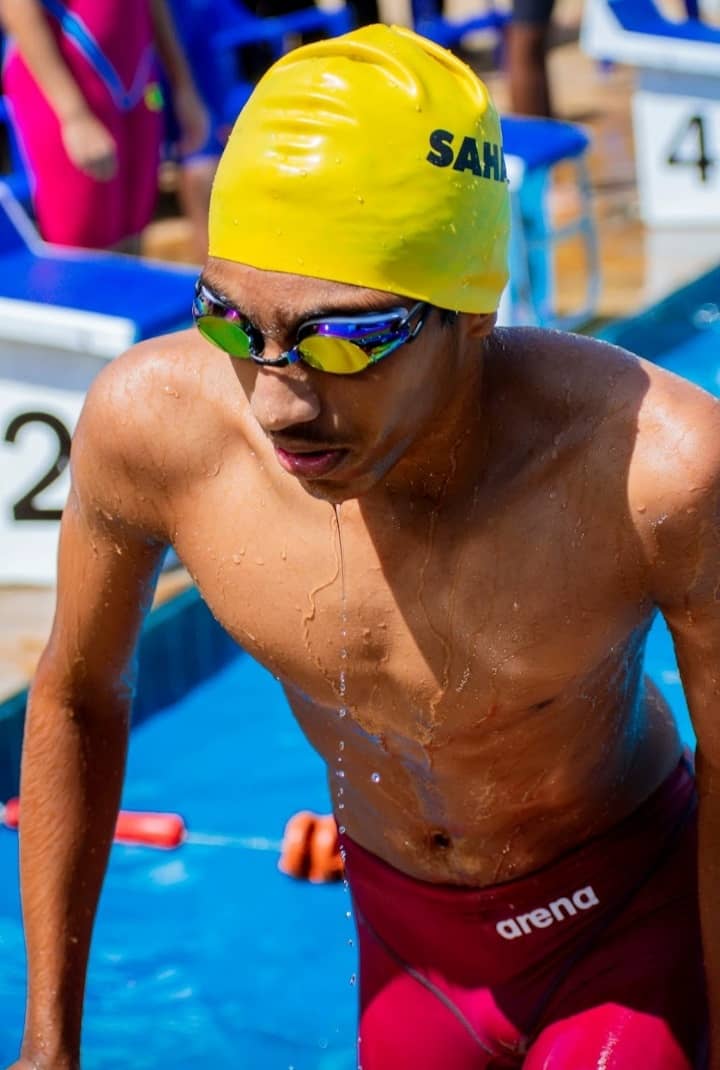 Sahal swimming in competition